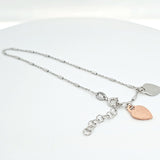 SS bracelet w/ 2 hearts
